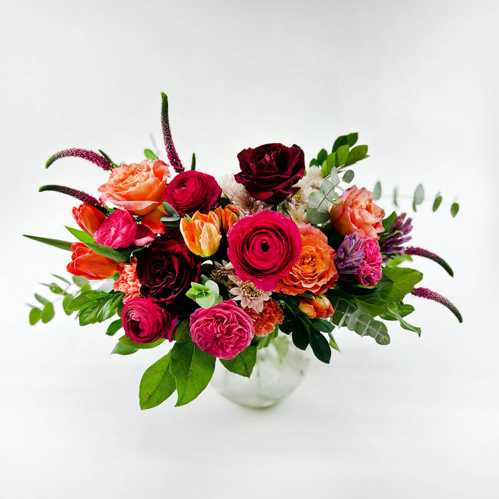 
                      
                        Image of a daring bouquet featuring spring flowers and roses, including hyacinth, tulips, hot pink ranunculus, veronica, lisianthus, and blush hydrangea. Order online for same-day flower delivery from Toronto's best florist, available near you.
                      
                    