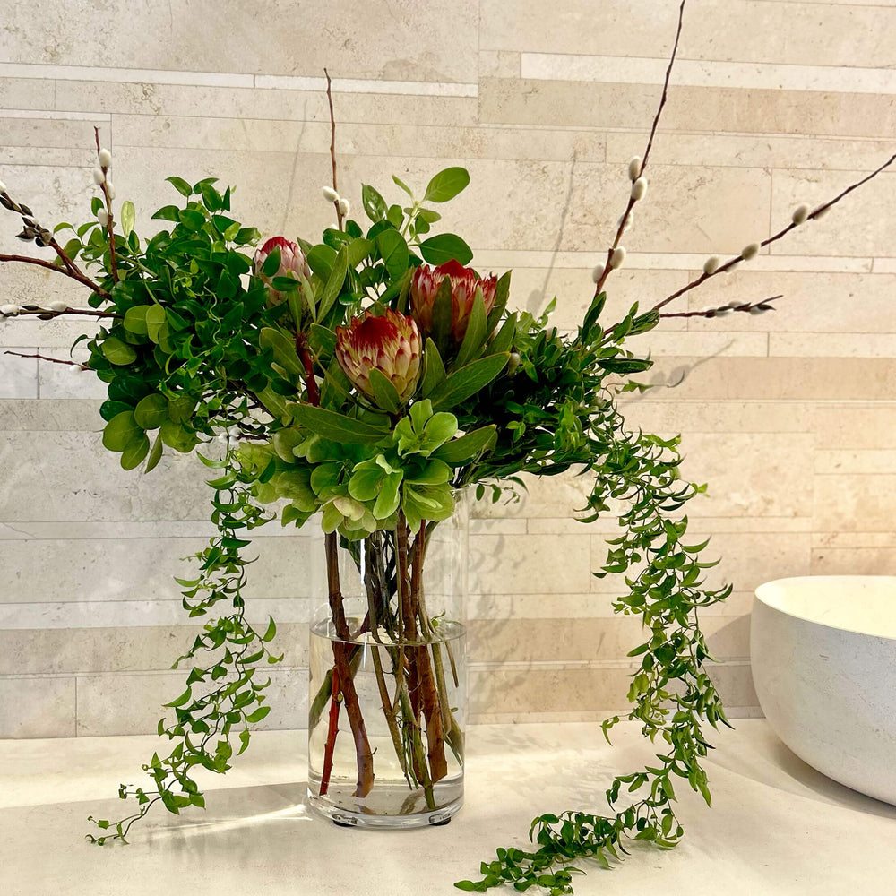 
                      
                        Small entrance flower arrangement on a workplace bathroom countertop, workplace weeklies for B2B flowers in Toronto, Quince Flowers – Toronto’s best florist, available near you.
                      
                    