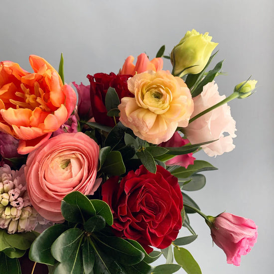 Image of vibrant flowers in saturated tones, delivering cheer and inspiration. Order online for same-day flower delivery from the best Toronto florist, available near you.