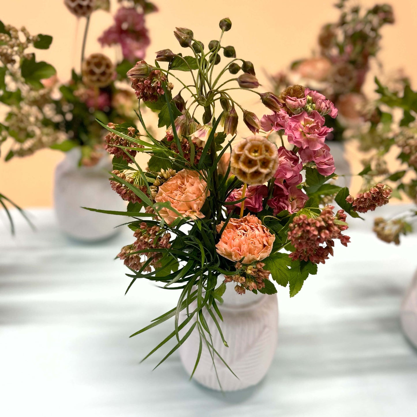 Workplace mini large tabletop arrangement – for a workplace countertop, workplace weeklies for B2B flowers in Toronto, Quince Flowers – Toronto’s best B2B florist, available near you.